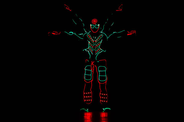 istock dance team in costumes of the LEDs, light suits 914533768