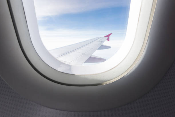 istock Looking out the window of a plane 914535468