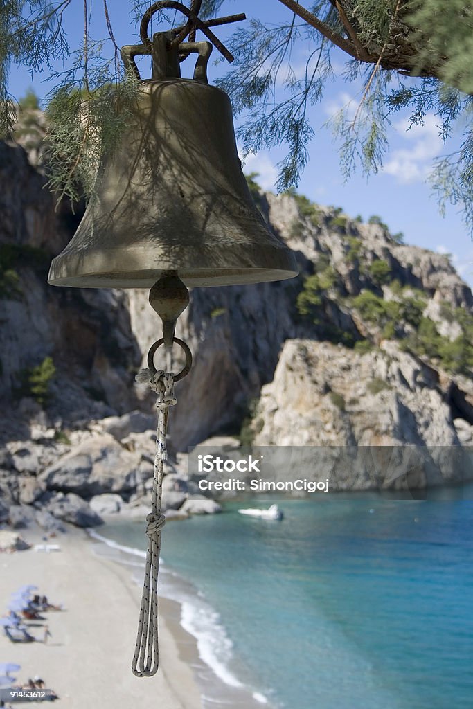 Bell above Kira Panagia beach  Beach Stock Photo