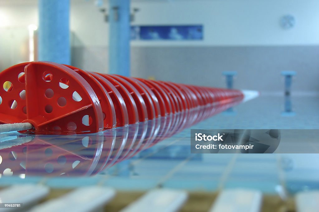 Close up of red swimming pool lane line swimming pool with red line Swimming Pool Stock Photo