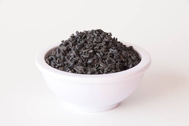 istock Green tea leaves in a bowl 91453922
