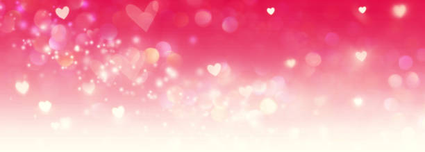 istock Shiny hearts and abstract lights background 914541364