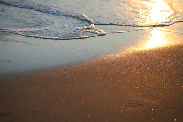 Shore line at sunset stock photo