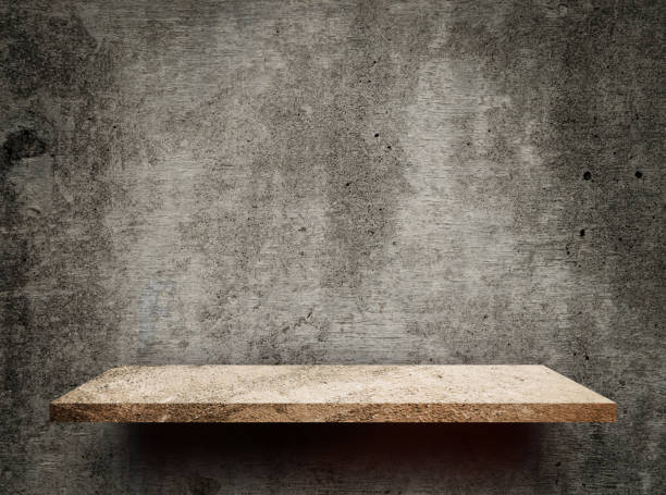 istock Empty Creamy rock shelf on gray cement wall 914545076