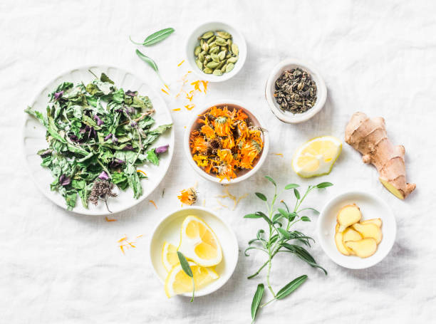 Ingredients for liver detox antioxidant tea on a light background, top view. Dry herbs, roots, flowers for homeopathy recipe for detox drink. Flat lay Ingredients for liver detox antioxidant tea on a light background, top view. Dry herbs, roots, flowers for homeopathy recipe for detox drink. Flat lay anti inflammatory stock pictures, royalty-free photos & images