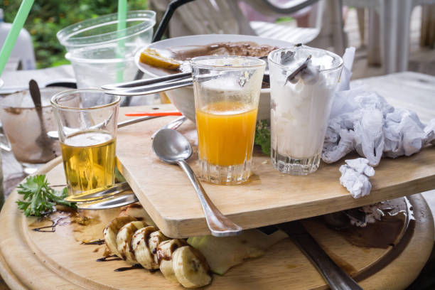 istock Messy table after eating dessert on the wooden table 914545950