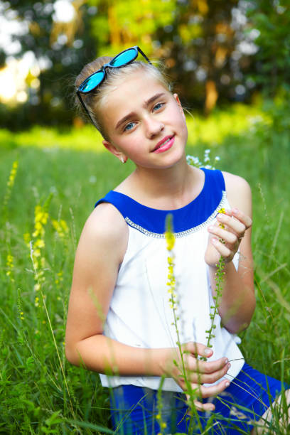 istock Young girl in the garden 914548378