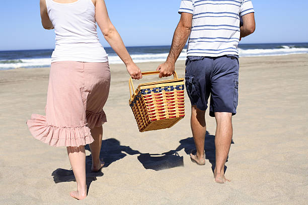istock Couple walking with picnic basket 91454916