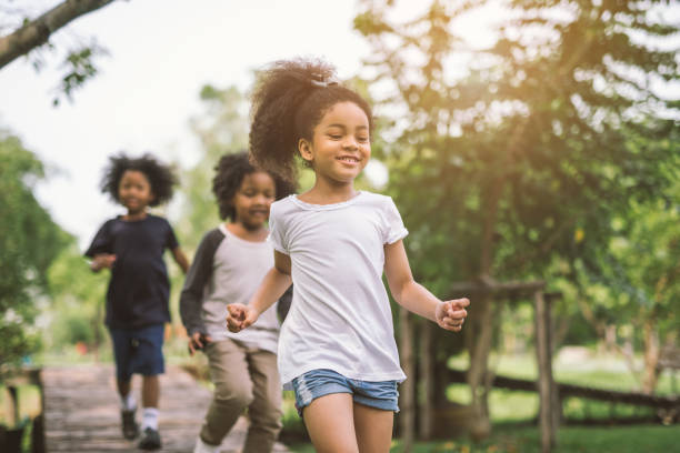 istock little girl playing outdoor 914552128