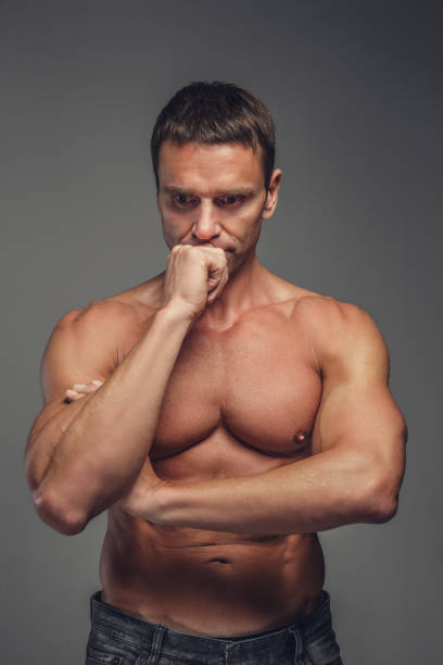 istock Middle age shirtless muscular man. 914558608