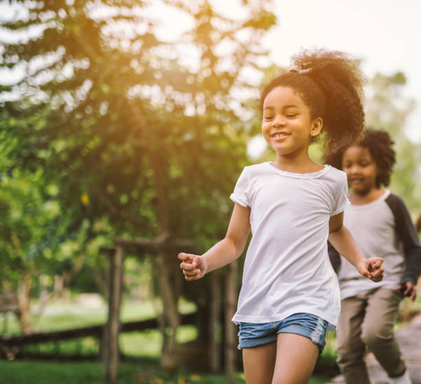istock little girl playing outdoor 914558702