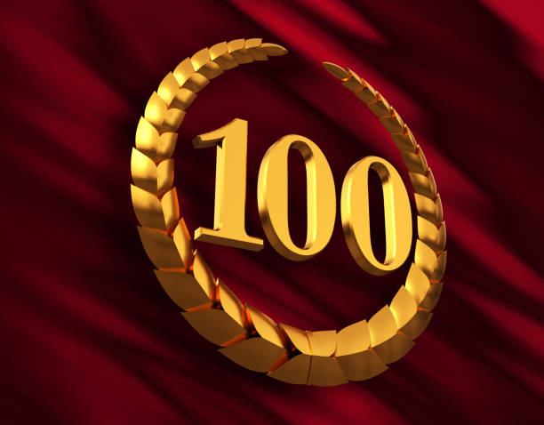 istock Anniversary Golden Laurel Wreath And Numeral 100 On Red Flag 914559698