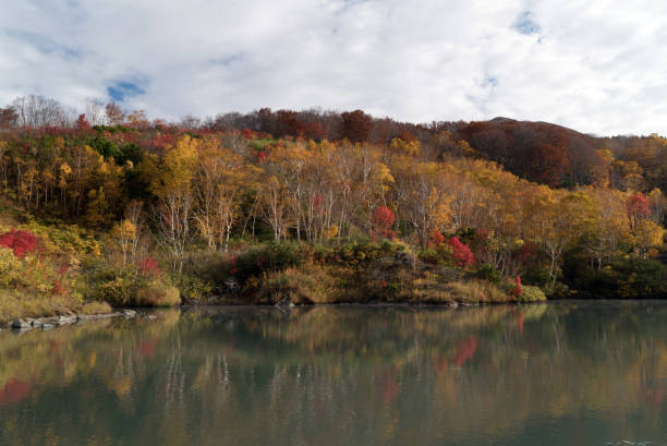 istock Autumn Onsen Lake Aomori Japan 914561814