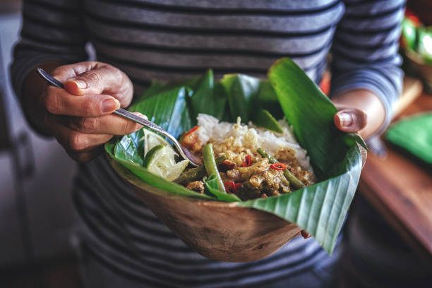 istock Indonesian Chicken Curry Dish with Rice Served on Banana Leaf 914570962