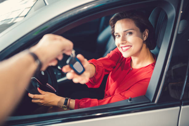 istock Smiling woman in luxury car 914571138