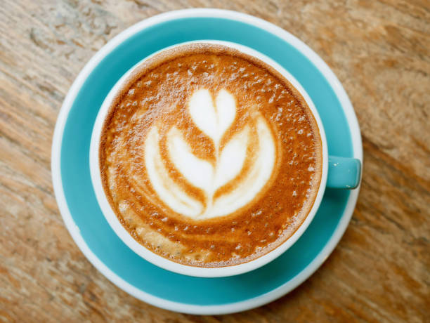 istock A cup of coffee latte art with steamed milk 914572436