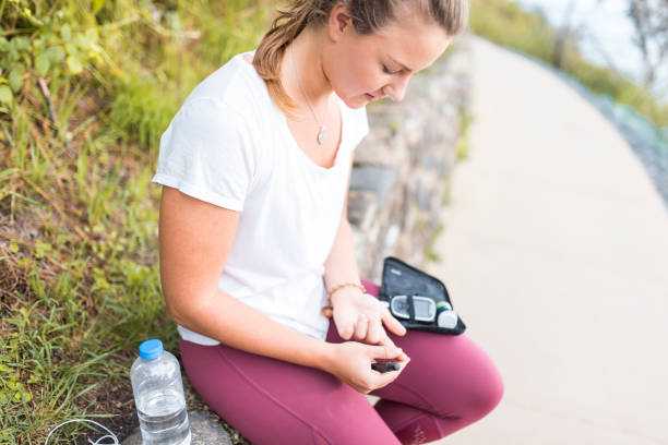 Woman measuring glucose after workout