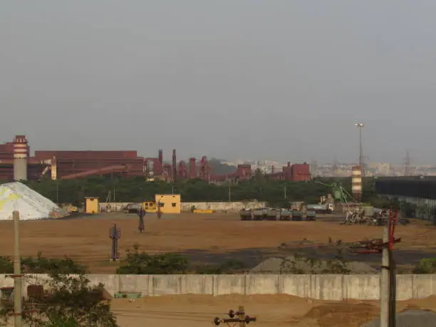 This image has taken form visakhapatnam from near a flyover, Andhra Pradesh, India. this plant producing steel for Vizag.