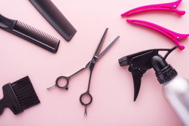 istock Hairdresser tools on pink background . Top view 914581998
