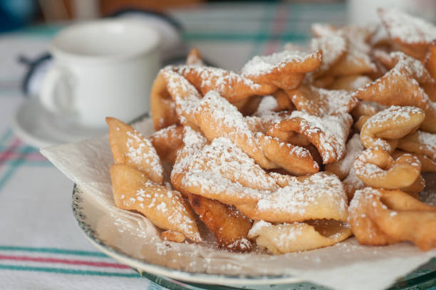 istock alsatian donuts with icing sugar in a plate 914588726