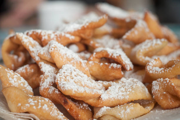 istock alsatian donuts with icing sugar in a plate 914588736