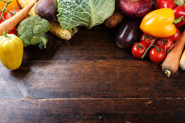 istock Summer vegetables on a brown wooden background 914588850