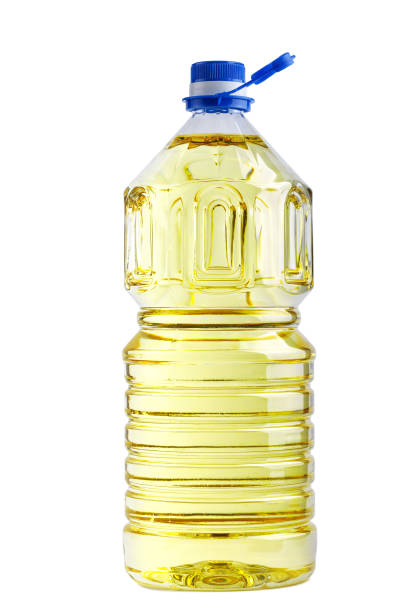 bottle with sunflower oil on white background stock photo