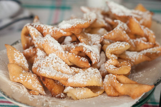 istock alsatian donuts with icing sugar in a plate 914590722