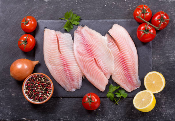 istock fresh fish fillet with ingredients for cooking 914599550