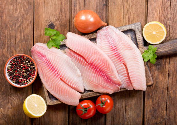 istock fresh fish fillet with ingredients for cooking 914599616