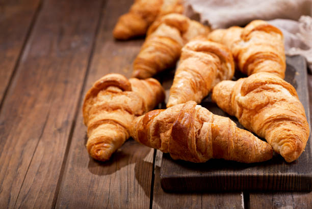 istock croissants on a wooden board 914599680