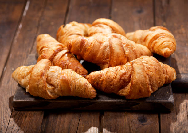 istock croissants on a wooden board 914599740