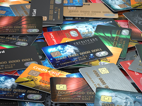 Pile of colored credit cards background, 3d illustration\n\n