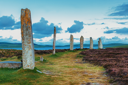 Part of the Neolithic stone circle known as the Ring of Brodgar, on the Orkney Islands of Scotland just after dawn. The site dates back to between 2500BC to 2000BC and is part of a wider archaeological complex containing Skara Brae, the Stones of Stenness and Maeshowe.