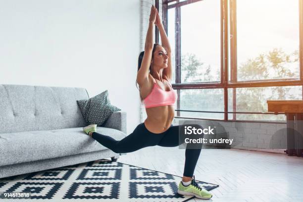 Fit Woman Doing Front Forward One Leg Step Lunge Exercises Workout Stock Photo - Download Image Now