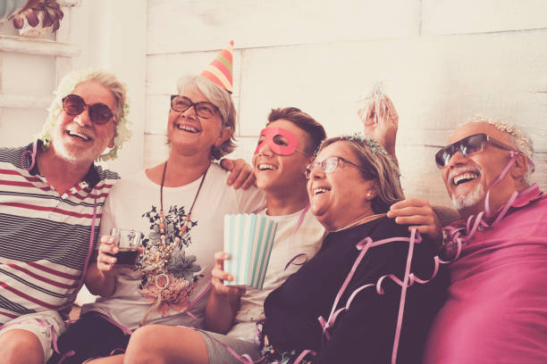 istock family celebrating on the sofa 914622470