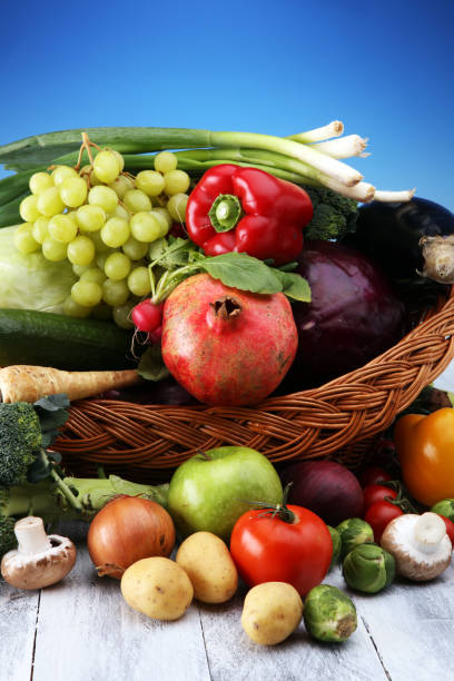 istock Composition with variety of raw organic vegetables and fruits. Balanced diet 914625310