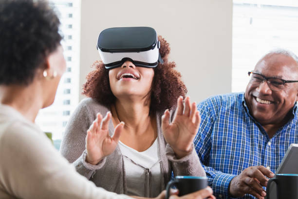 istock Young woman with virtual reality headset 914628138