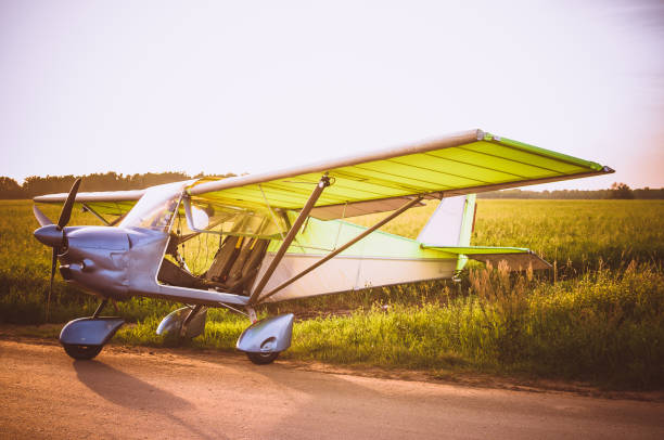 istock Small plane in the sky and on the field 914637248