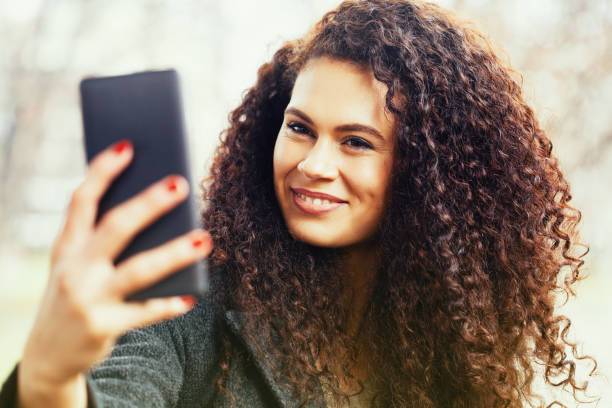 istock Beautiful woman taking a selfie 914644774