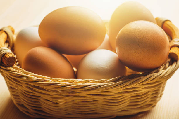 istock Easter eggs in wooden basket, close up 914648176