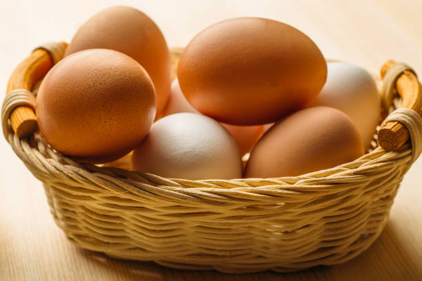istock Easter eggs in wooden basket 914648242