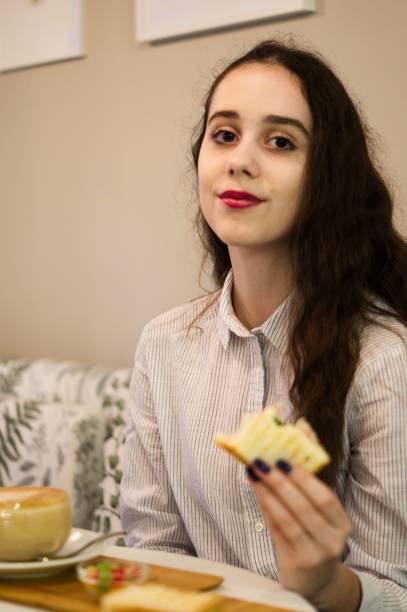 Pretty serious lady have business lunch