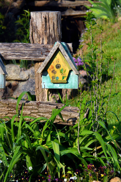 istock Birdhouse Mounted on Rustic Fence 914661936
