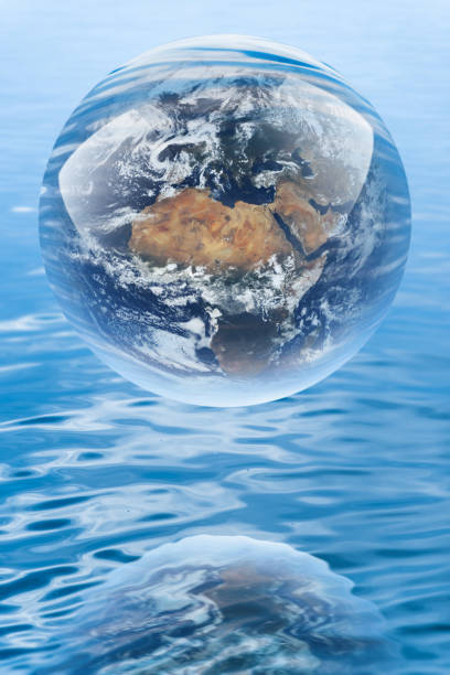 istock Crystal ball reflecting globe of the earth 914673002