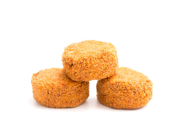 istock Lushious Battered Crab Cakes Isolated on a White Background 914676874