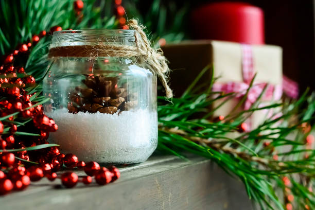 istock Candle on the table near the Christmas tree. Christmas present 914683006
