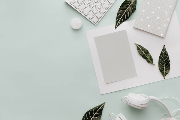 istock Modern Pastel Hipster Flat Lay With Headphones, keyboard and leaves 914687064
