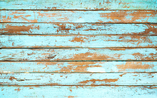 Vintage beach wood background - Old weathered wooden plank painted in blue color.