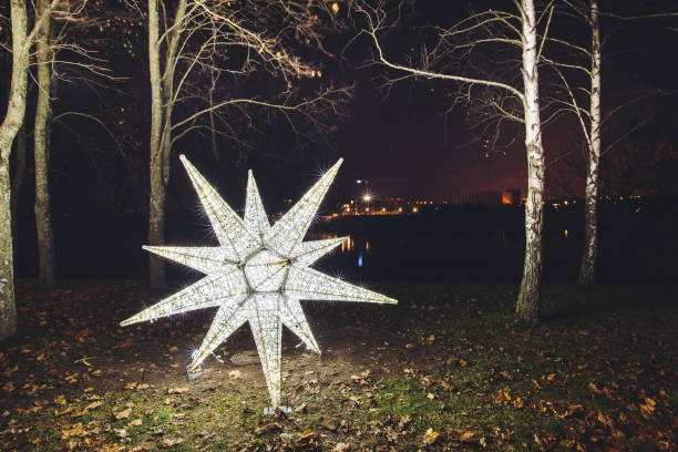 istock Close-Up Of Illuminated Star Shape Lantern At Night 914707638
